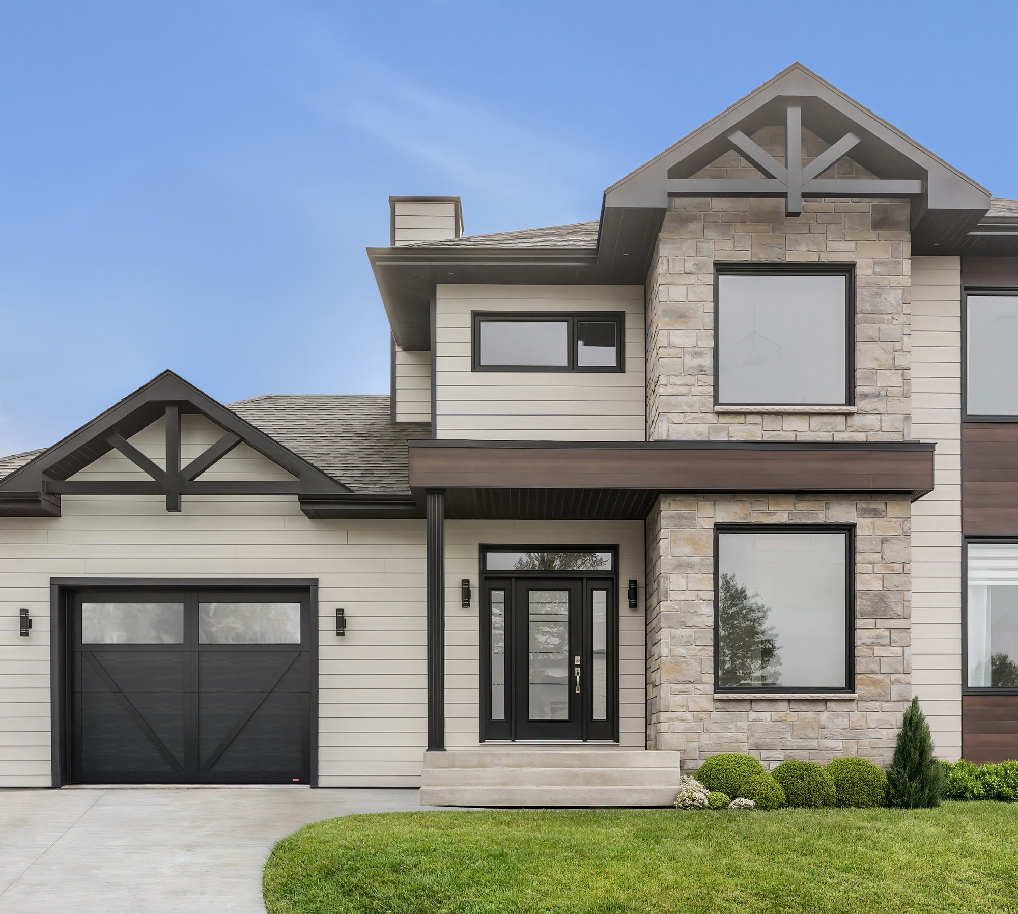 Carriage house garage door with decorative hardware