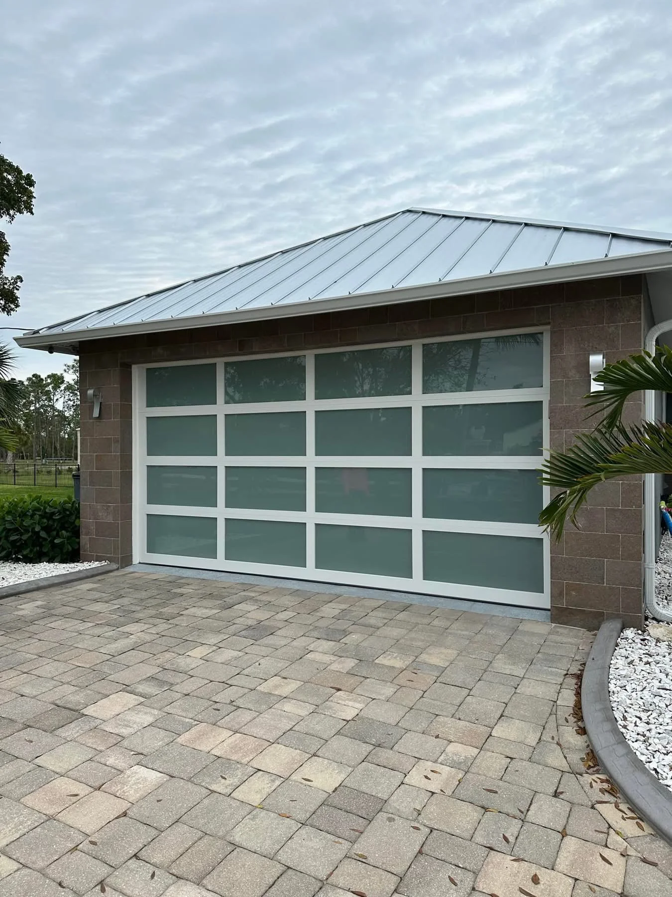 Privacy glass aluminum garage door — Metro Vancouver