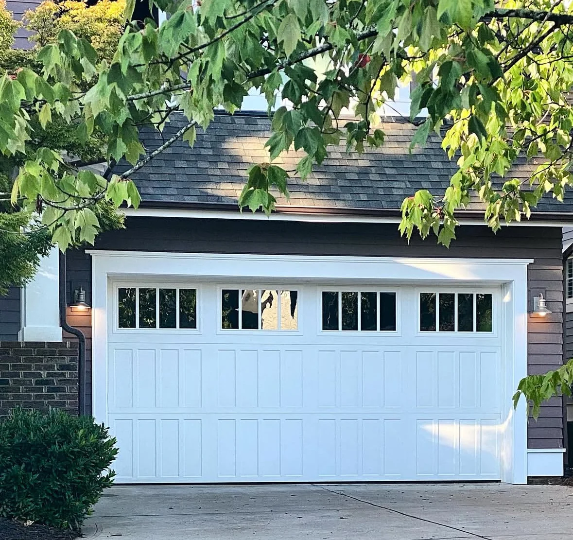 Stamped steel carriage garage door — Metro Vancouver