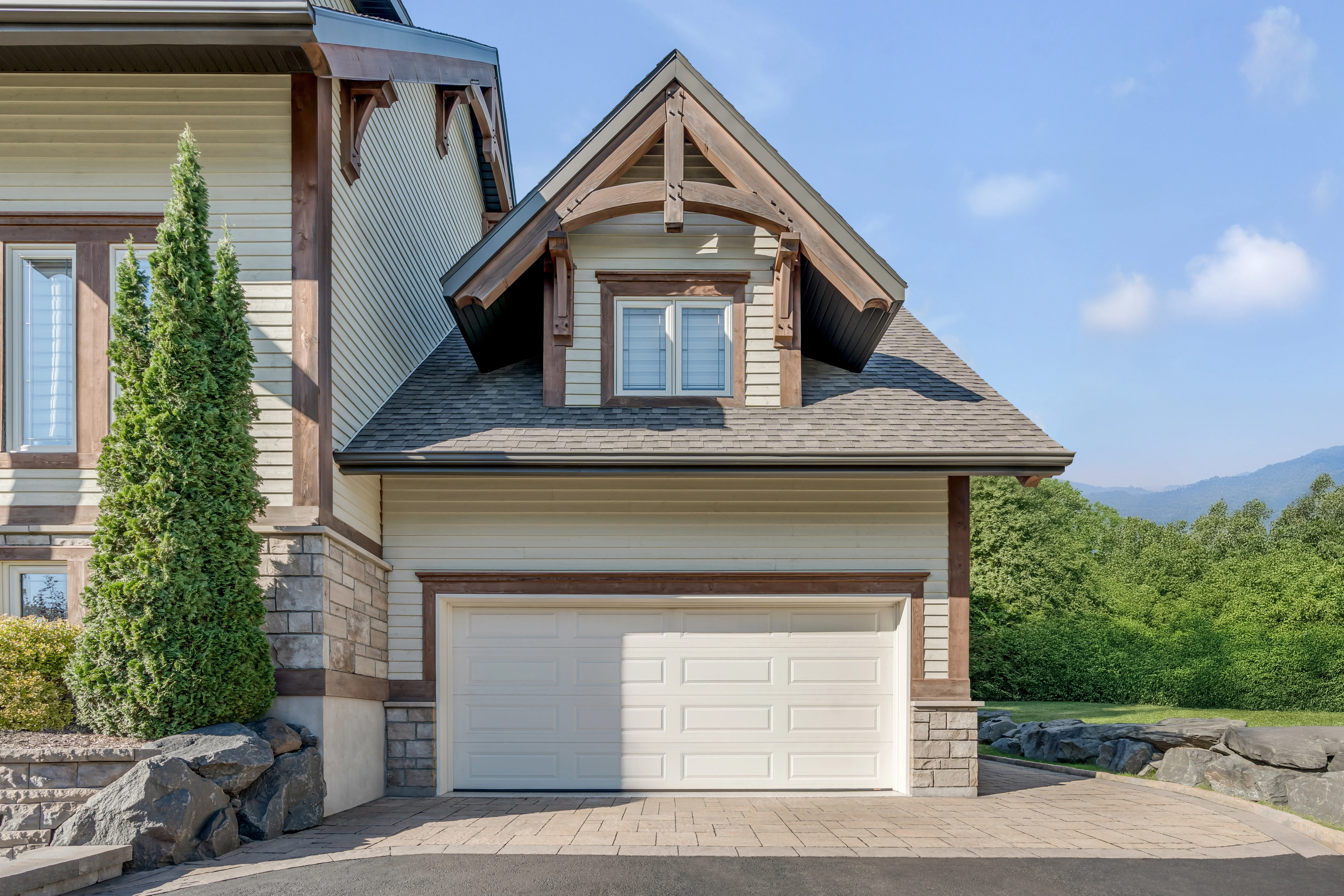 Traditional long-panel garage door on a Metro Vancouver home — garage door cost guide